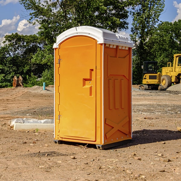 how often are the portable restrooms cleaned and serviced during a rental period in Navarre